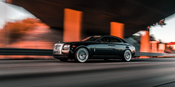 rolls-royce car in motion