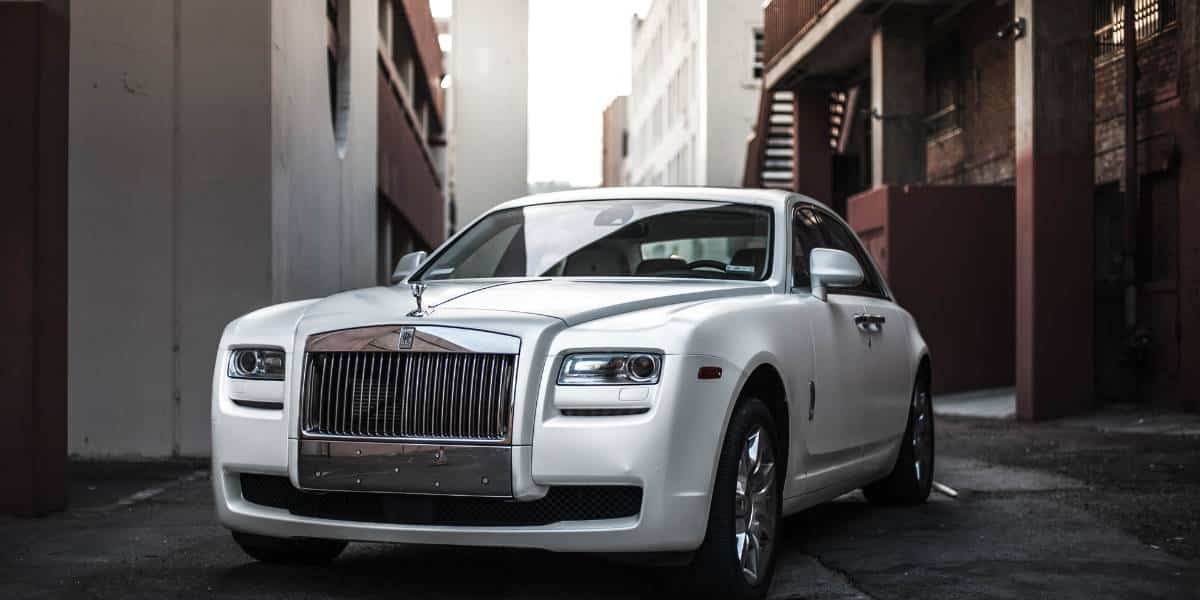 An electric Rolls Royce on the road.